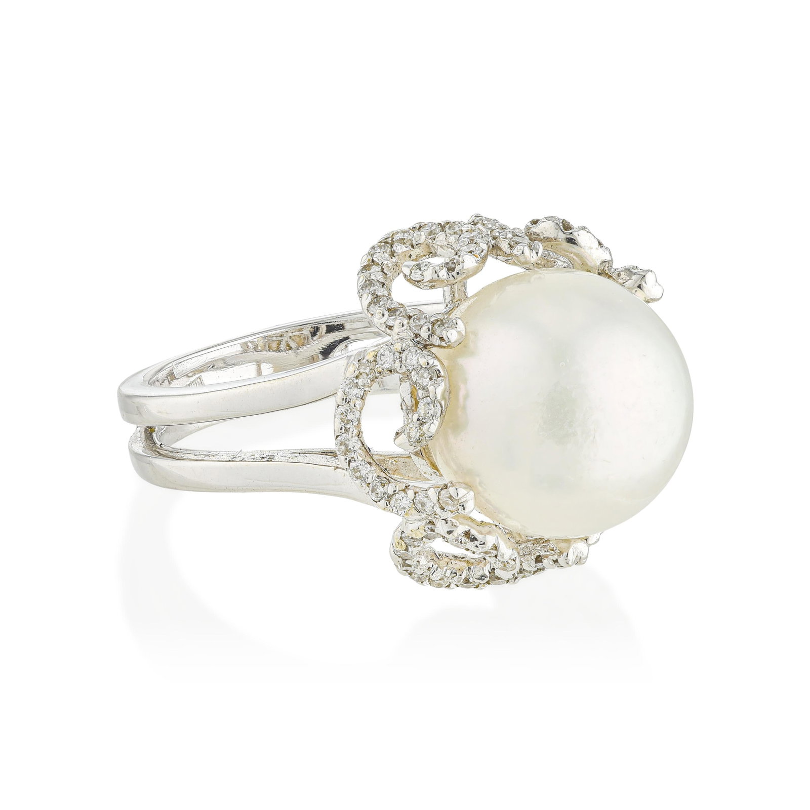 Pearl and Diamond Ring: ESTIMATED RETAIL PRICE: $5,500* *This is the estimated value a piece of similar quality, craftsmanship, and characteristics could command at retail. This statement ring reimagines the classic pearl de