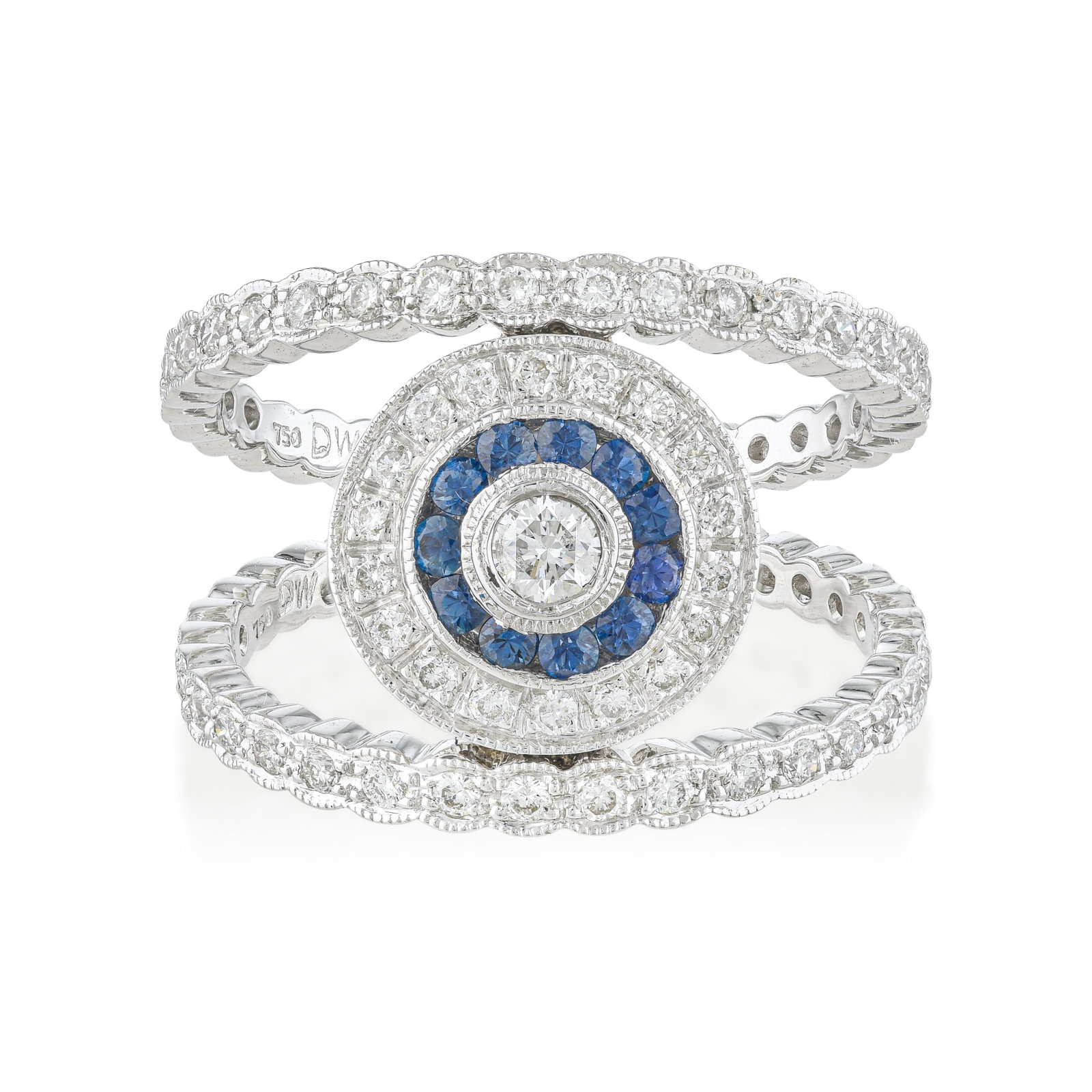 Diamond and Sapphire Bull's Eye Ring: ESTIMATED RETAIL PRICE: $6,000* *This is the estimated value a piece of similar quality, craftsmanship, and characteristics could command at retail. The bull's eye format is a genuine piece of design