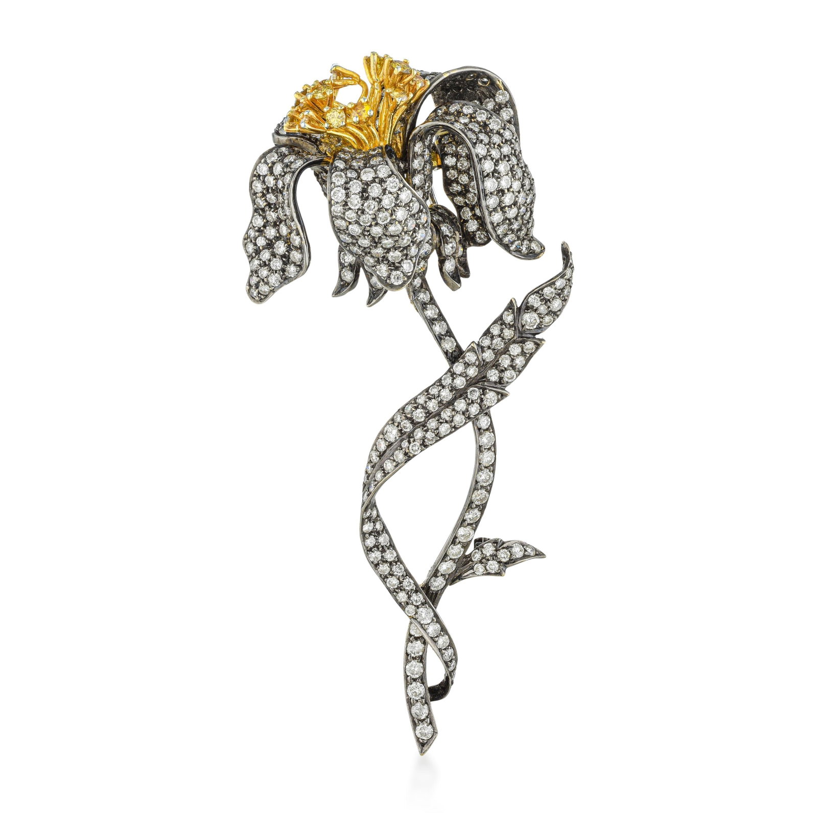 Diamond and Fancy Diamond Flower Pin: ESTIMATED RETAIL PRICE: $22,000* *This is the estimated value a piece of similar quality, craftsmanship, and characteristics could command at retail. This exquisite floral brooch is a masterclass in