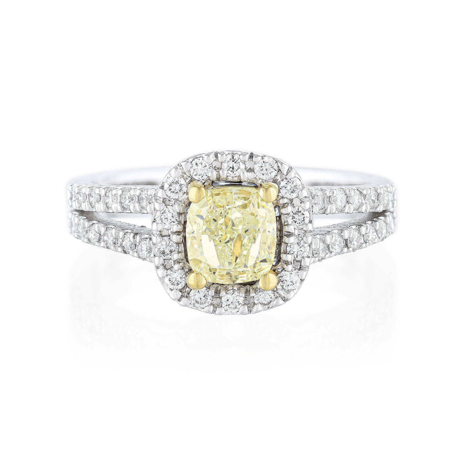 Yellow Diamond and White Diamond Ring: ESTIMATED RETAIL PRICE: $8,500* *This is the estimated value a piece of similar quality, craftsmanship, and characteristics could command at retail. Pairing a light yellow center with white diamond