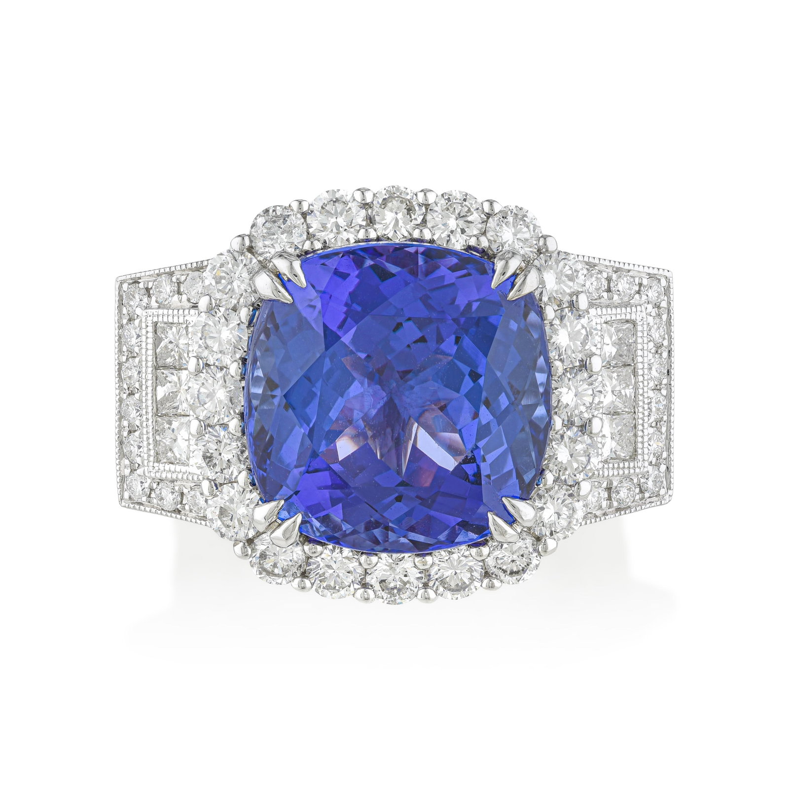12.33-Carat Tanzanite and Diamond Ring: ESTIMATED RETAIL PRICE: $24,500* *This is the estimated value a piece of similar quality, craftsmanship, and characteristics could command at retail. At 12.33 carats in a cushion cut, this tanzanite i