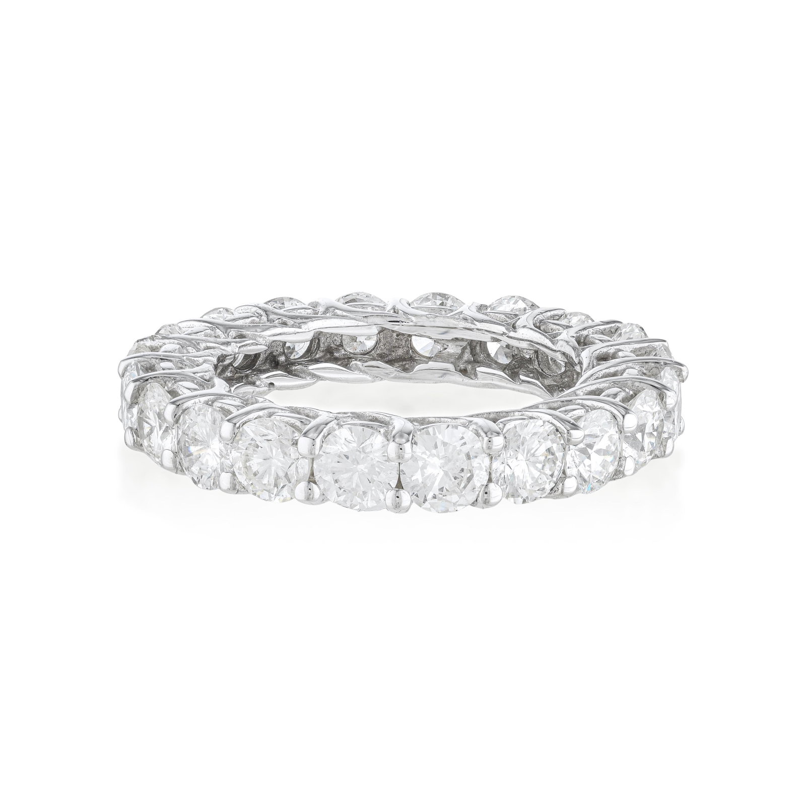 Diamond Eternity Band: Summary of Key Characteristics • Metal: 14K white gold • Gemstone(s): Round brilliant cut diamonds approx. 5.15 carats total, most H-I/VS • Measurements: 3.5 mm • Ring Size: 7