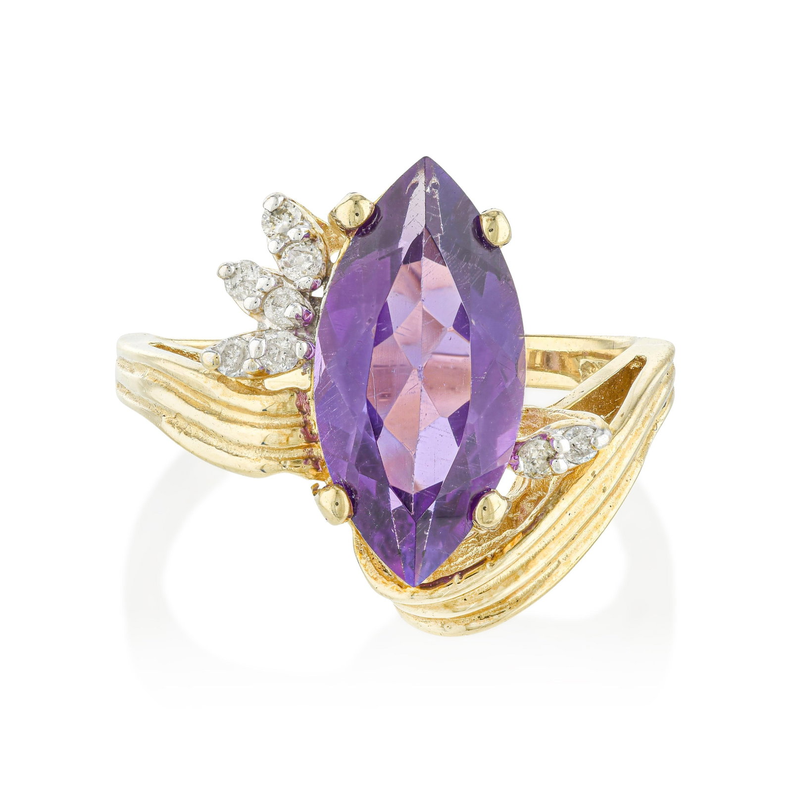 Vintage Amethyst and Diamond Cocktail Ring: ESTIMATED RETAIL PRICE: 3,500* *This is the estimated value a piece of similar quality, craftsmanship, and characteristics could command at retail. Built around an elongated marquise-cut amethyst disp