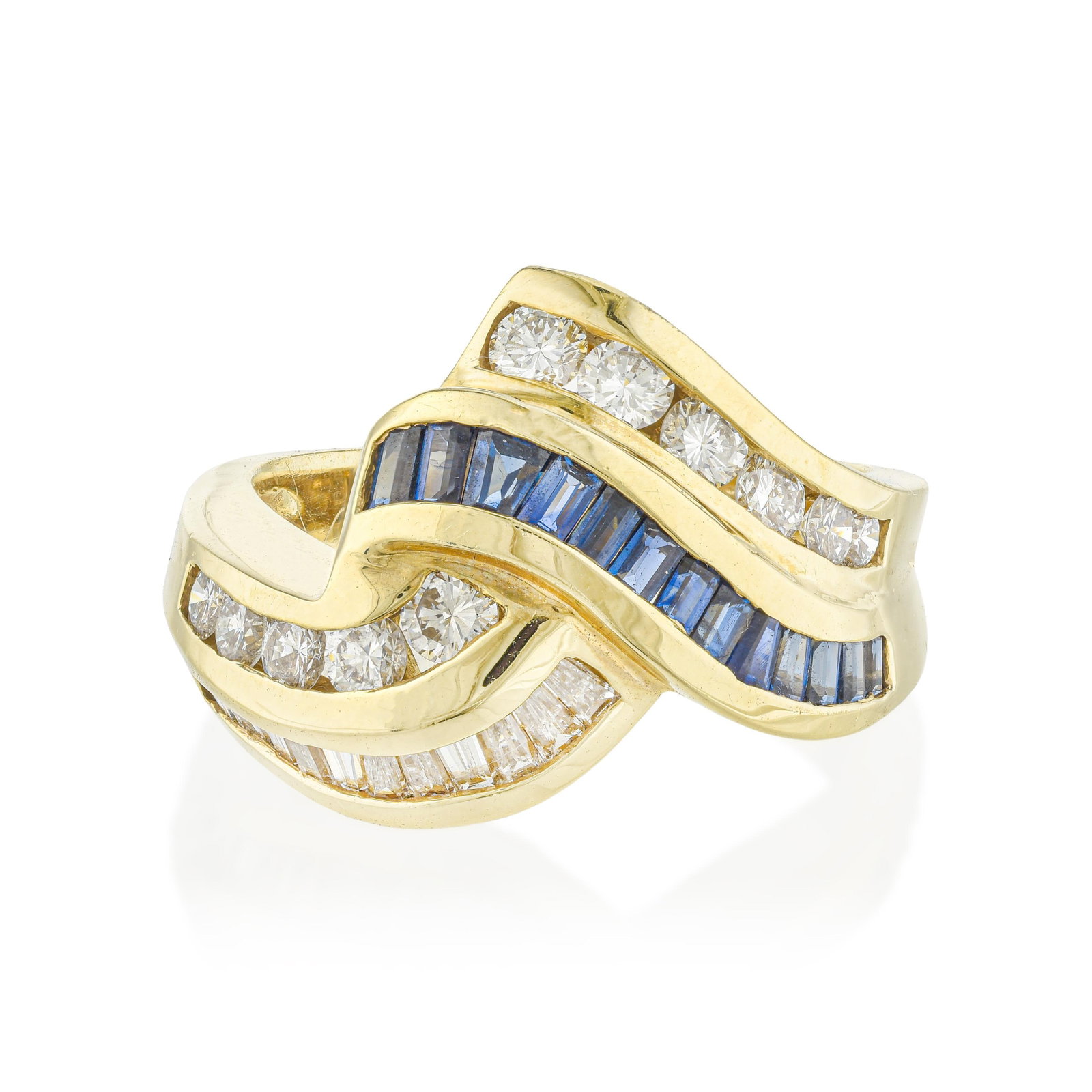 Vintage Sapphire and Diamond Wave Cocktail Ring: ESTIMATED RETAIL PRICE: 7,000* *This is the estimated value a piece of similar quality, craftsmanship, and characteristics could command at retail. Capturing the energetic movement of mid-century