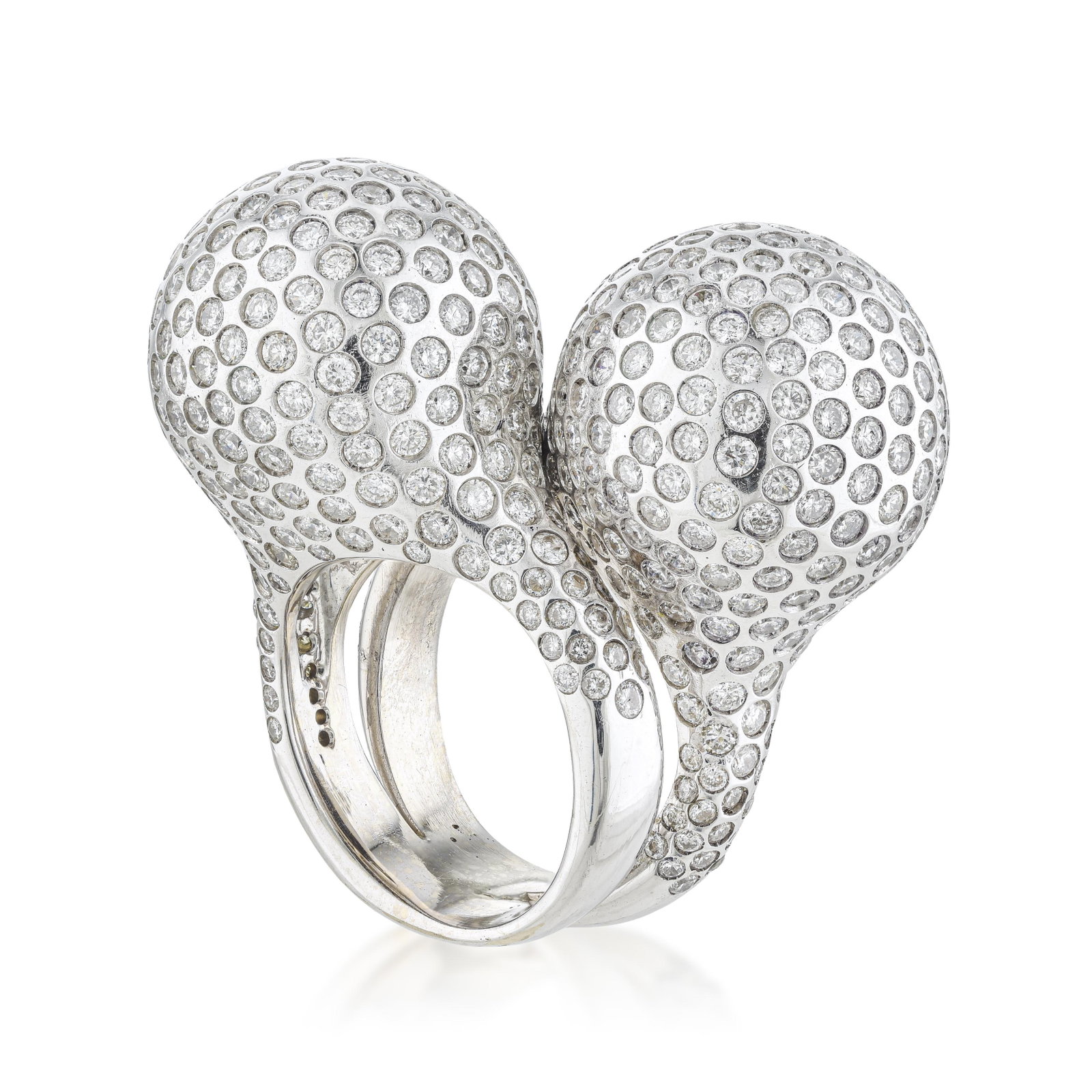 Vintage Double Diamond Ball Ring: ESTIMATED RETAIL PRICE: 15,750* *This is the estimated value a piece of similar quality, craftsmanship, and characteristics could command at retail. Bold, avant-garde, and unapologetically dramatic, t