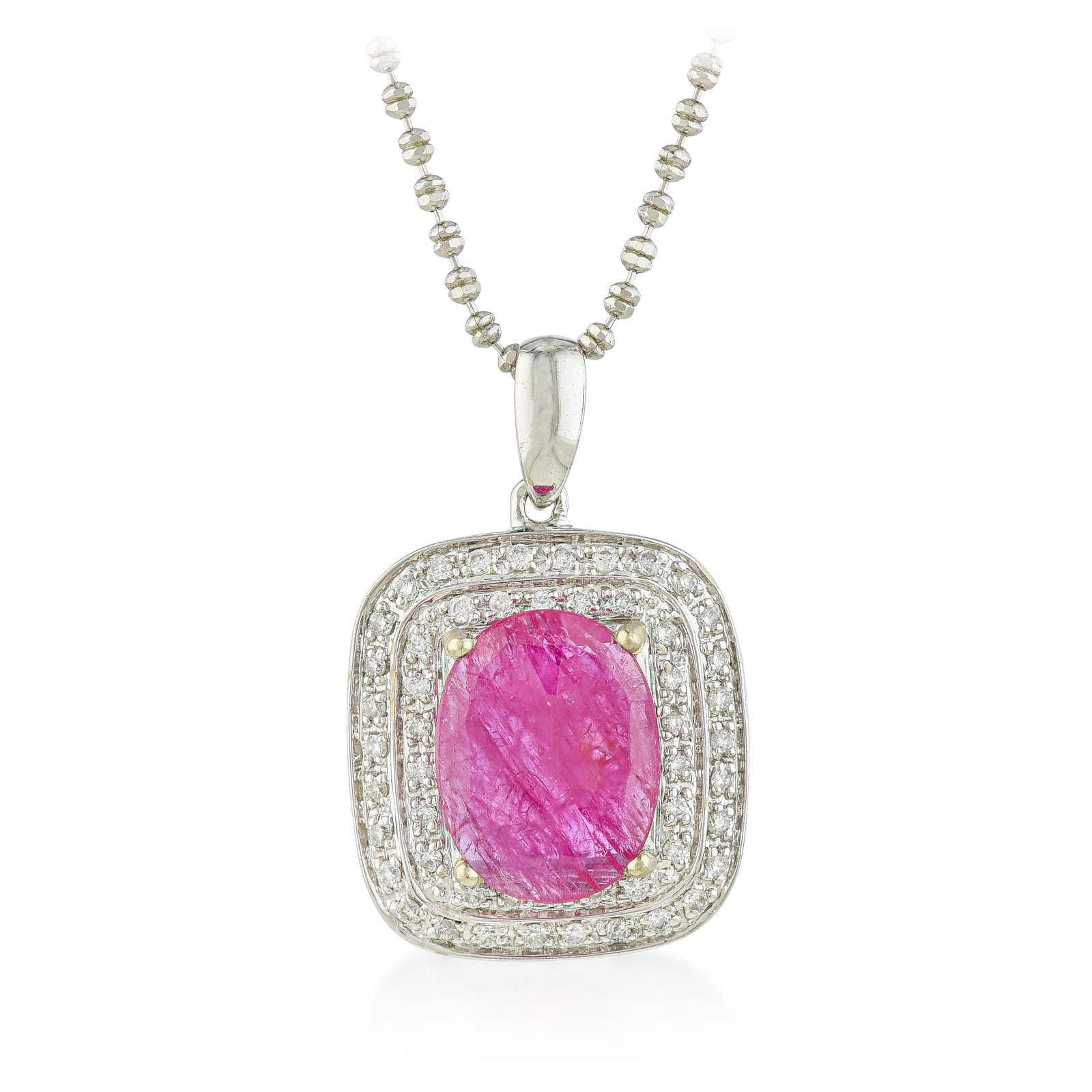 Ruby and Diamond Pendant Necklace: ESTIMATED RETAIL PRICE: 6,125* *This is the estimated value a piece of similar quality, craftsmanship, and characteristics could command at retail. A vibrant magenta-red oval ruby takes center stage