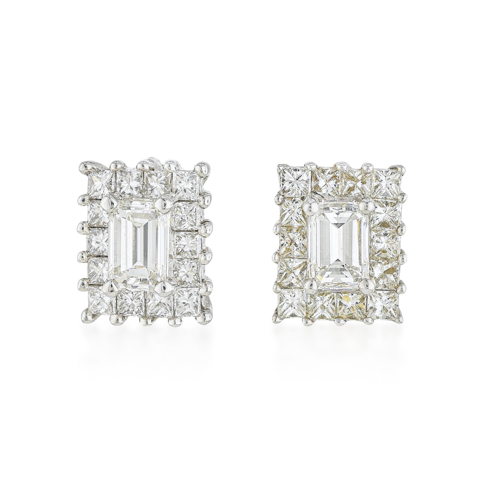 Emerald and Princess Cut Diamond Cluster Earrings: ESTIMATED RETAIL PRICE: 7,000* *This is the estimated value a piece of similar quality, craftsmanship, and characteristics could command at retail. An architectural masterclass in geometric light,