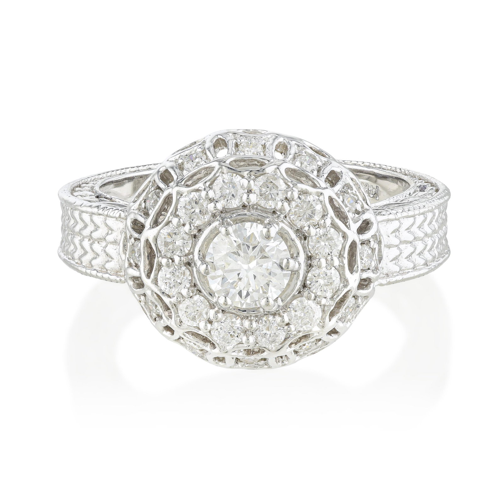 Diamond Cluster Ring: ESTIMATED RETAIL PRICE: 5,250* *This is the estimated value a piece of similar quality, craftsmanship, and characteristics could command at retail. Radiating vintage charm, this round medallion ring f