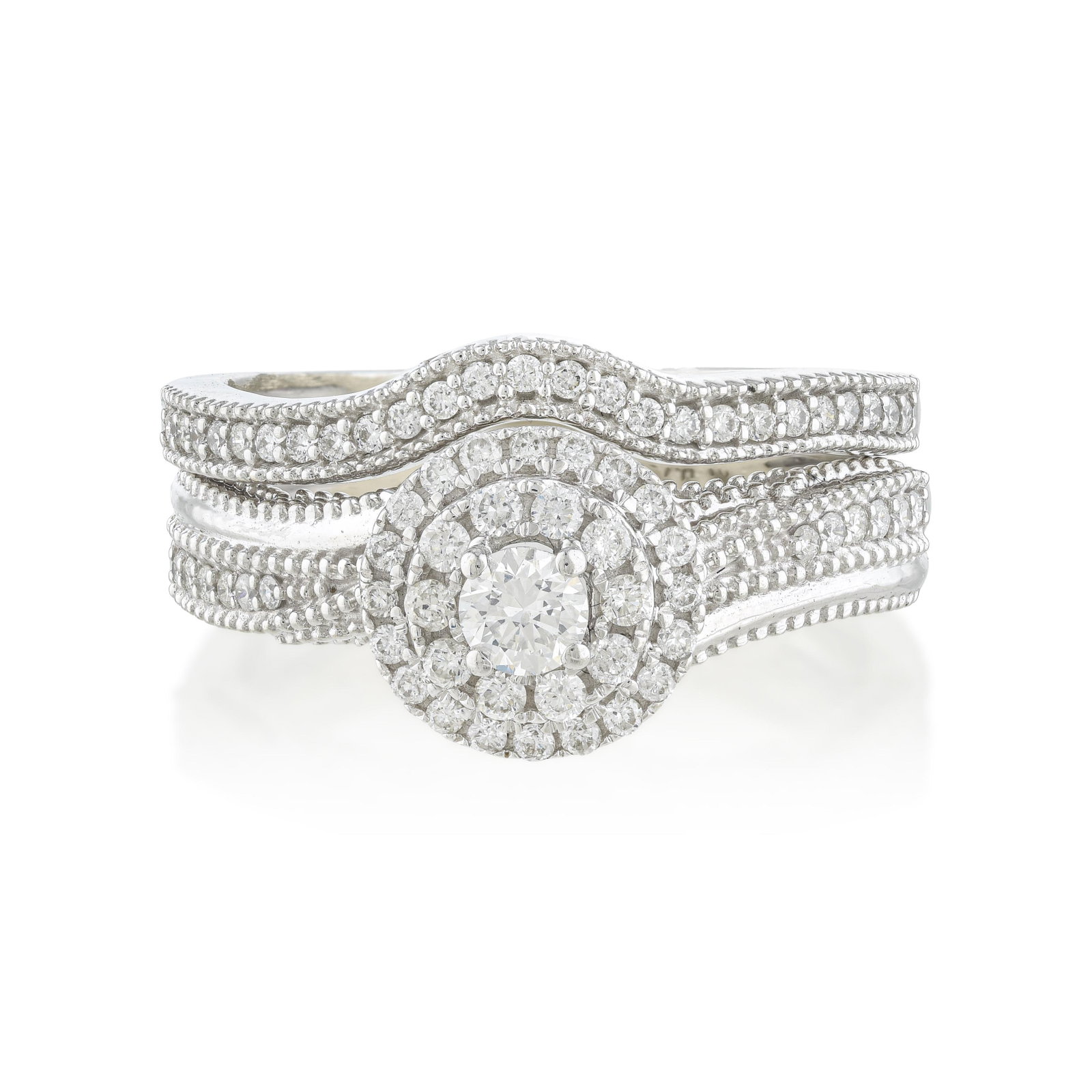 Diamond Wedding Set: ESTIMATED RETAIL PRICE: 5,250* *This is the estimated value a piece of similar quality, craftsmanship, and characteristics could command at retail. Designed to nest seamlessly together, this