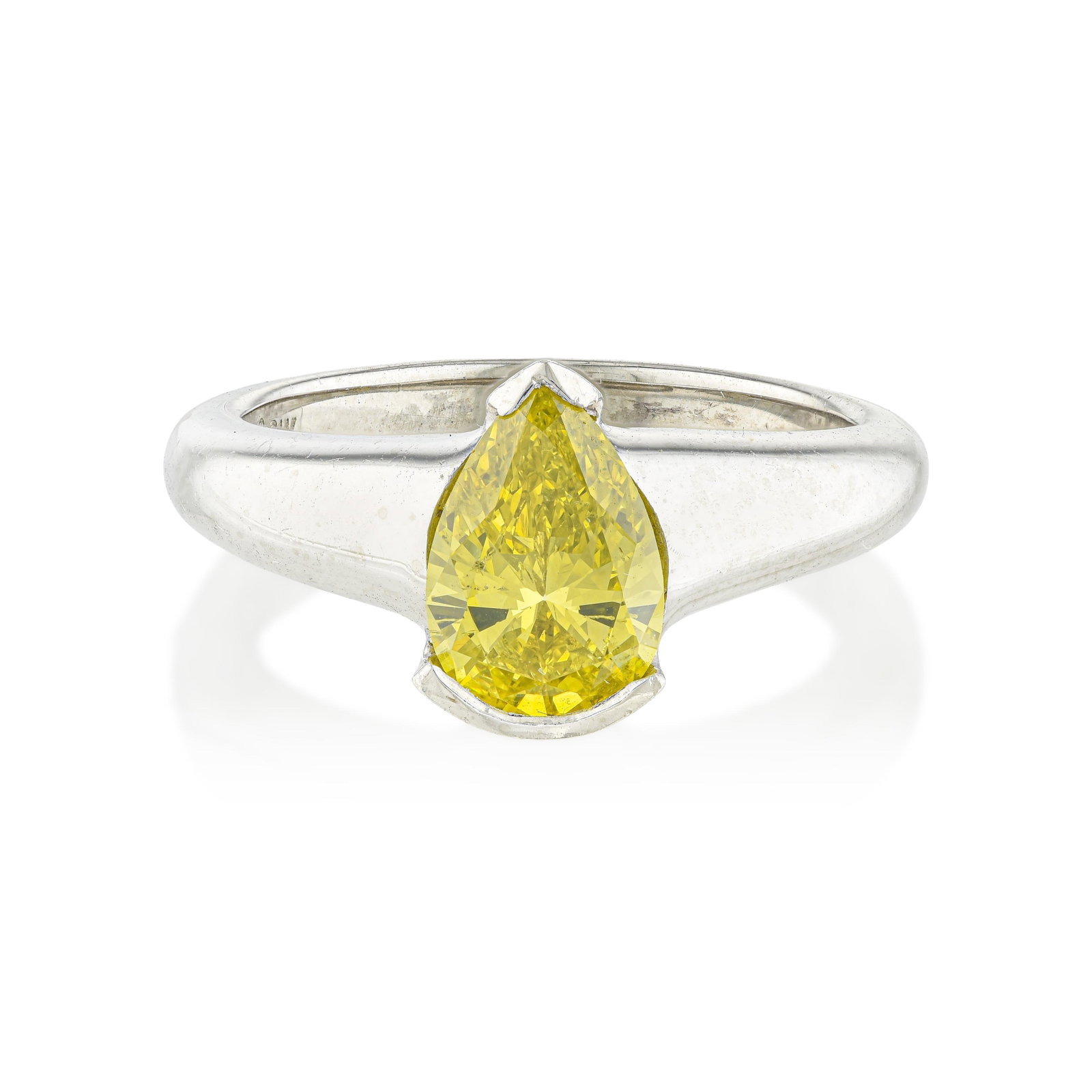 Treated Fancy Yellow and White Diamond Ring: ESTIMATED RETAIL PRICE: 7,000* *This is the estimated value a piece of similar quality, craftsmanship, and characteristics could command at retail. Sculptured minimalism at its finest. A vivid