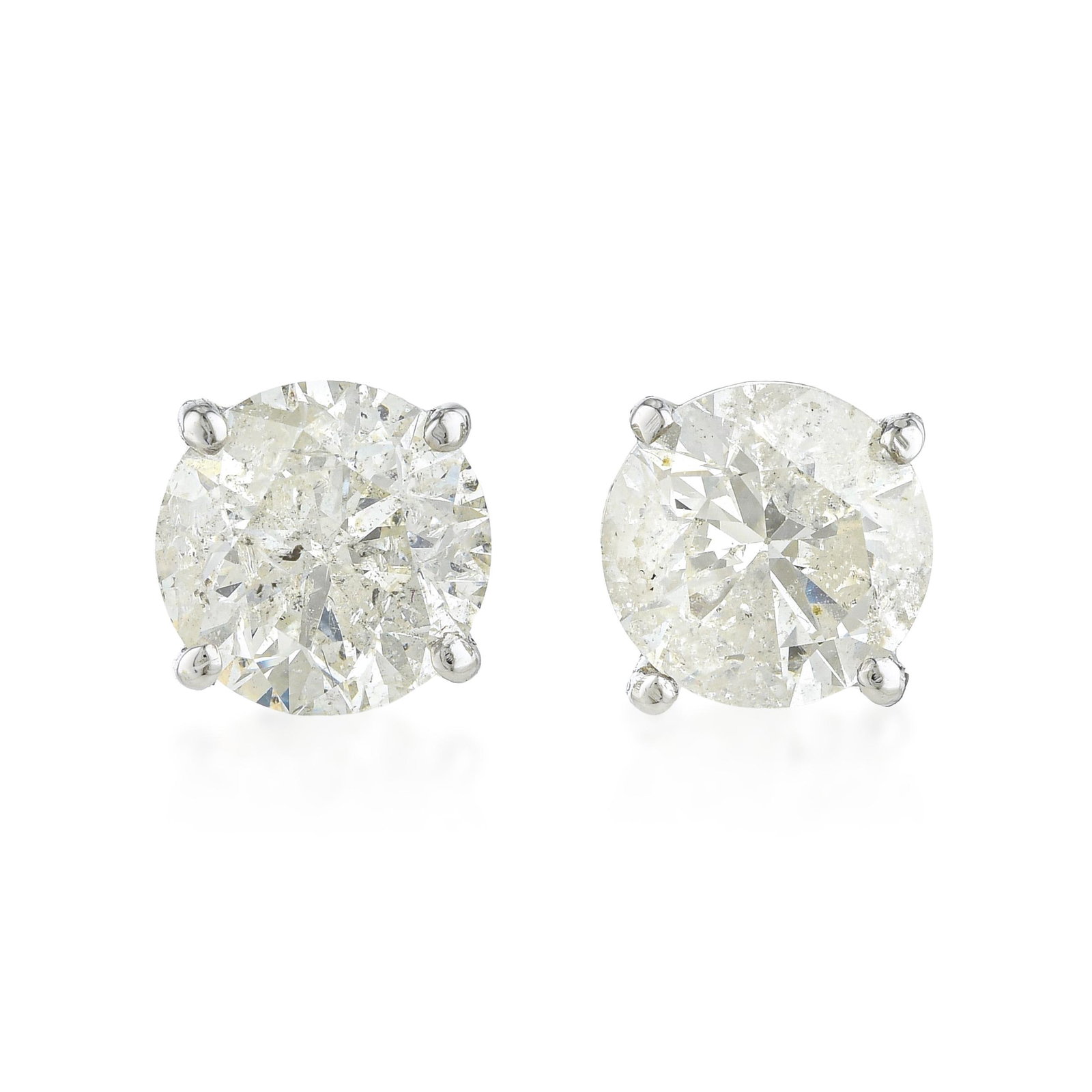 Diamond Stud Earrings (Approx. 2.01 CTW): ESTIMATED RETAIL PRICE: 7,000* *This is the estimated value a piece of similar quality, craftsmanship, and characteristics could command at retail. A substantial pair of diamond studs represents the
