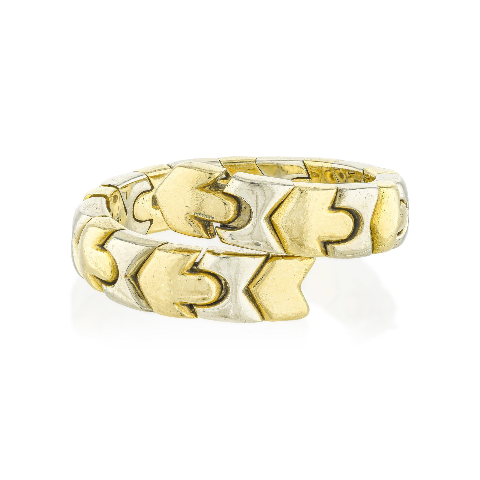 Bulgari Alveare Coil Ring: ESTIMATED RETAIL PRICE: 5,250* *This is the estimated value a piece of similar quality, craftsmanship, and characteristics could command at retail. Designed in the 1980s, the Bulgari Alveare collectio