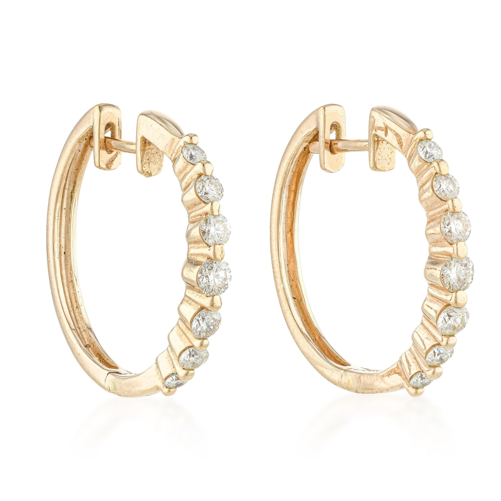 Diamond Hoop Earrings: ESTIMATED RETAIL PRICE: 2,625* *This is the estimated value a piece of similar quality, craftsmanship, and characteristics could command at retail. The classic single-row diamond hoop remains one of