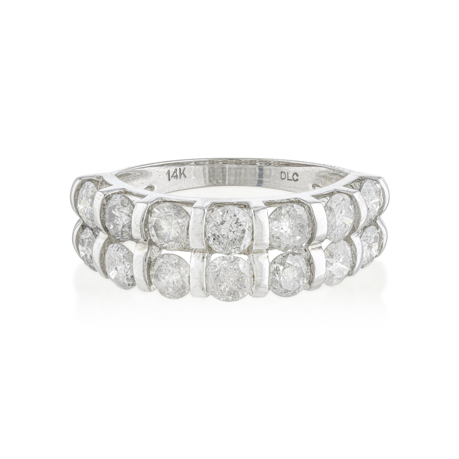 Two Row Diamond Ring: ESTIMATED RETAIL PRICE: 2,625* *This is the estimated value a piece of similar quality, craftsmanship, and characteristics could command at retail. Structured and clean, this low-profile band
