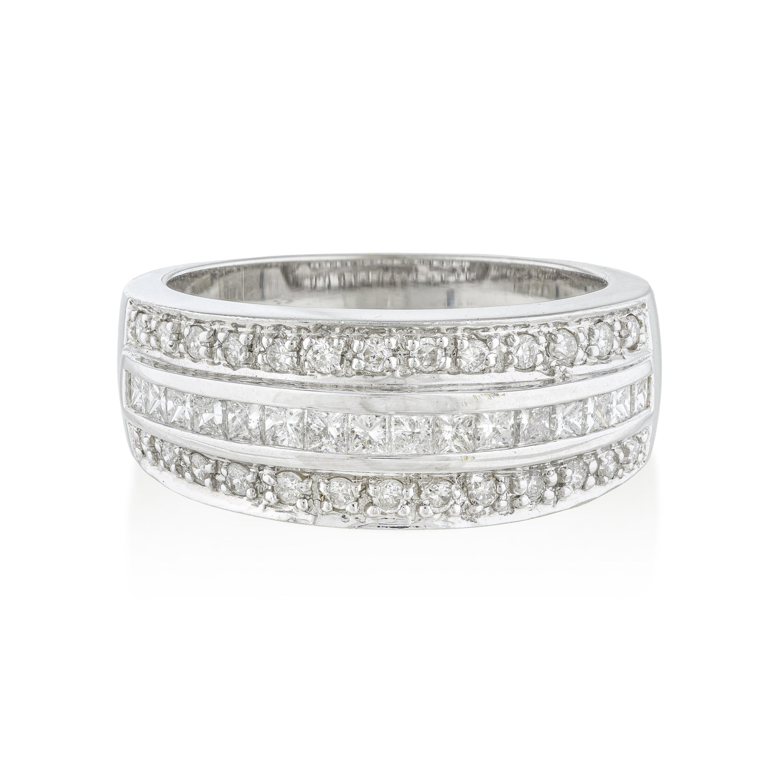 Triple-Row Channel Princess and Pave Diamond Band: ESTIMATED RETAIL PRICE: 5,250* *This is the estimated value a piece of similar quality, craftsmanship, and characteristics could command at retail. Architectural symmetry at its finest. A central row