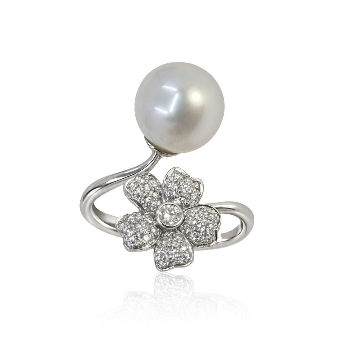 White South Sea Pearl and Diamond Flower Bypass Ring: ESTIMATED RETAIL PRICE: $3,400* *This is the estimated value a piece of similar quality, craftsmanship, and characteristics could command at retail. Sculptural and romantic, this 18K white gold