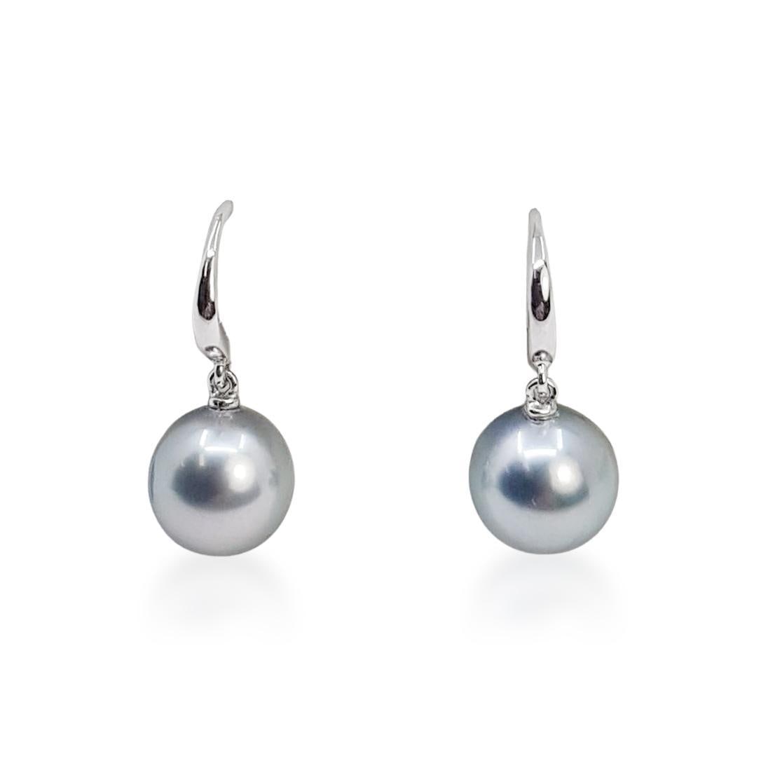 Silvery Tahitian Pearl Drop Earrings: ESTIMATED RETAIL PRICE: $1,150* *This is the estimated value a piece of similar quality, craftsmanship, and characteristics could command at retail. Celebrating the cool, metallic overtones of French 