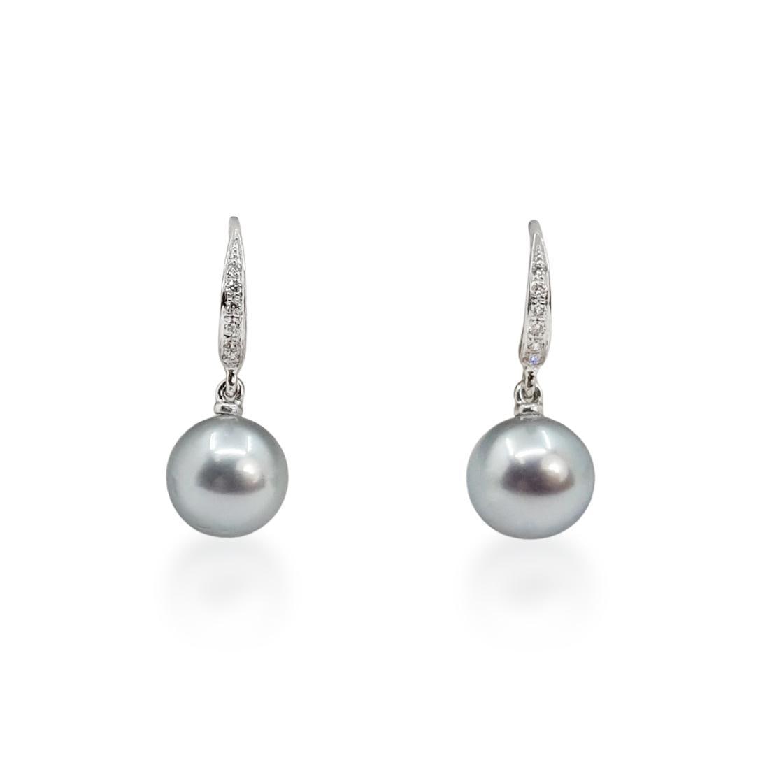 Tahitian Pearl and Diamond Drop Earrings: ESTIMATED RETAIL PRICE: $1,400* *This is the estimated value a piece of similar quality, craftsmanship, and characteristics could command at retail. Classic elegance meets cool iridescence in these
