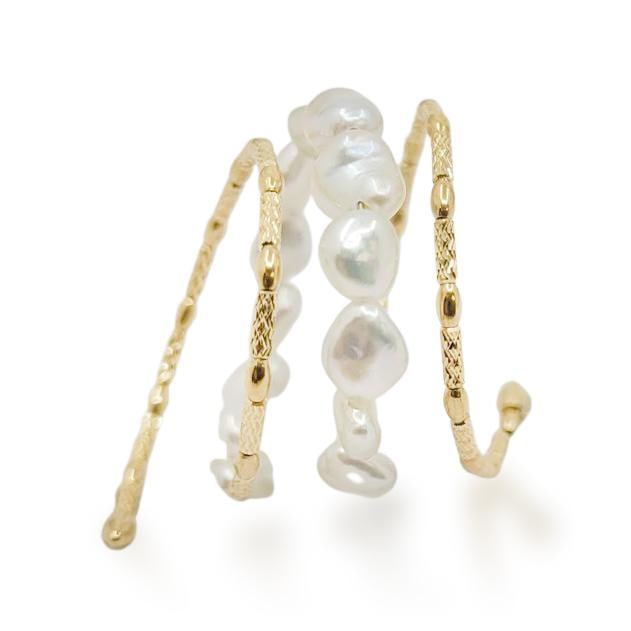 Keshi Akoya Pearl Wrap Ring: ESTIMATED RETAIL PRICE: $1,450* *This is the estimated value a piece of similar quality, craftsmanship, and characteristics could command at retail. Celebrating the organic shapes of Keshi pearls,