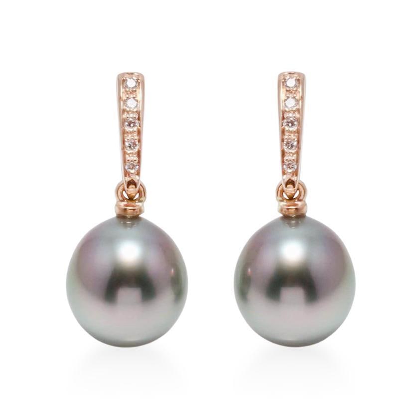 Peacock Tahitian Pearl and Diamond Drop Earrings: ESTIMATED RETAIL PRICE: $1,150* *This is the estimated value a piece of similar quality, craftsmanship, and characteristics could command at retail. Featuring dark, saturated peacock Tahitian pearls