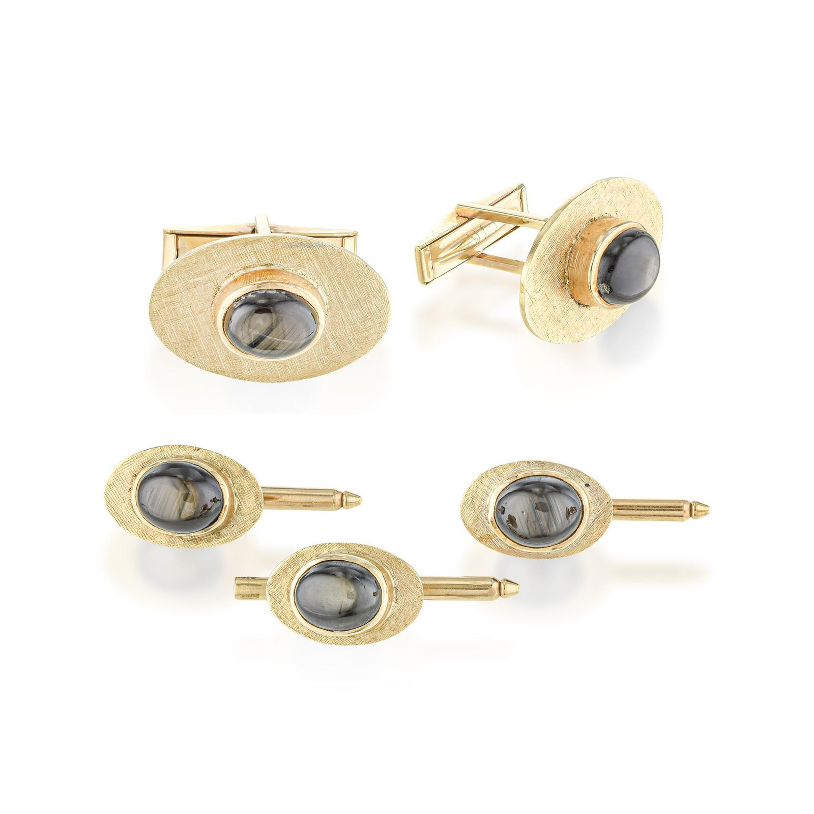 Black Star Sapphire Tuxedo Stud Set: ESTIMATED RETAIL PRICE: $5,000* *This is the estimated value a piece of similar quality, craftsmanship, and characteristics could command at retail. A coordinated gentleman's tuxedo set in 14K yellow