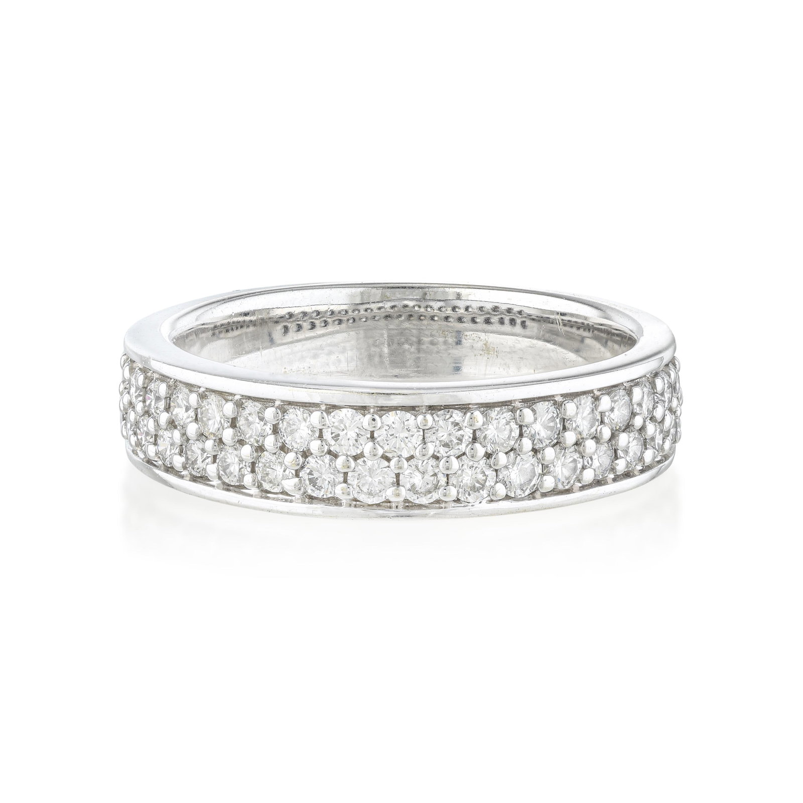 Double Row Diamond Band Ring: ESTIMATED RETAIL PRICE: $5,000* *This is the estimated value a piece of similar quality, craftsmanship, and characteristics could command at retail. Twin parallel rows of pavé-set round