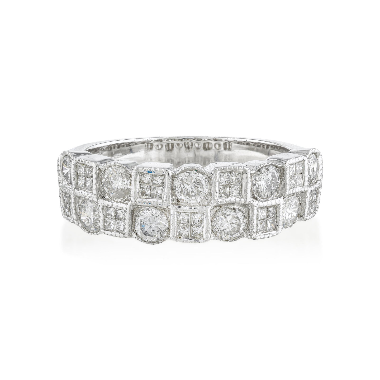 Diamond Band Ring: ESTIMATED RETAIL PRICE: $5,000* *This is the estimated value a piece of similar quality, craftsmanship, and characteristics could command at retail. Round brilliants in circular frames alternate with