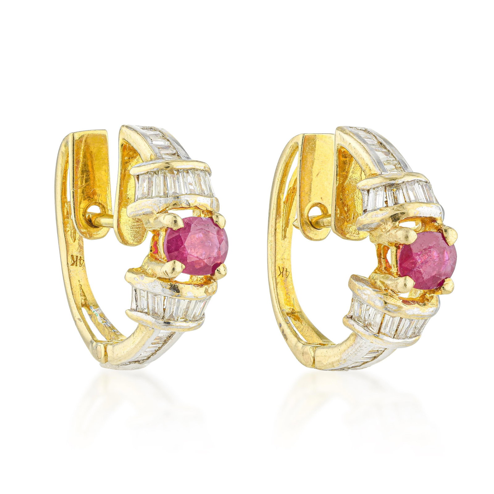 Vintage Ruby and Diamond Hoop Earrings: ESTIMATED RETAIL PRICE: $2,400* *This is the estimated value a piece of similar quality, craftsmanship, and characteristics could command at retail. Combining rich color contrast with a comfortable