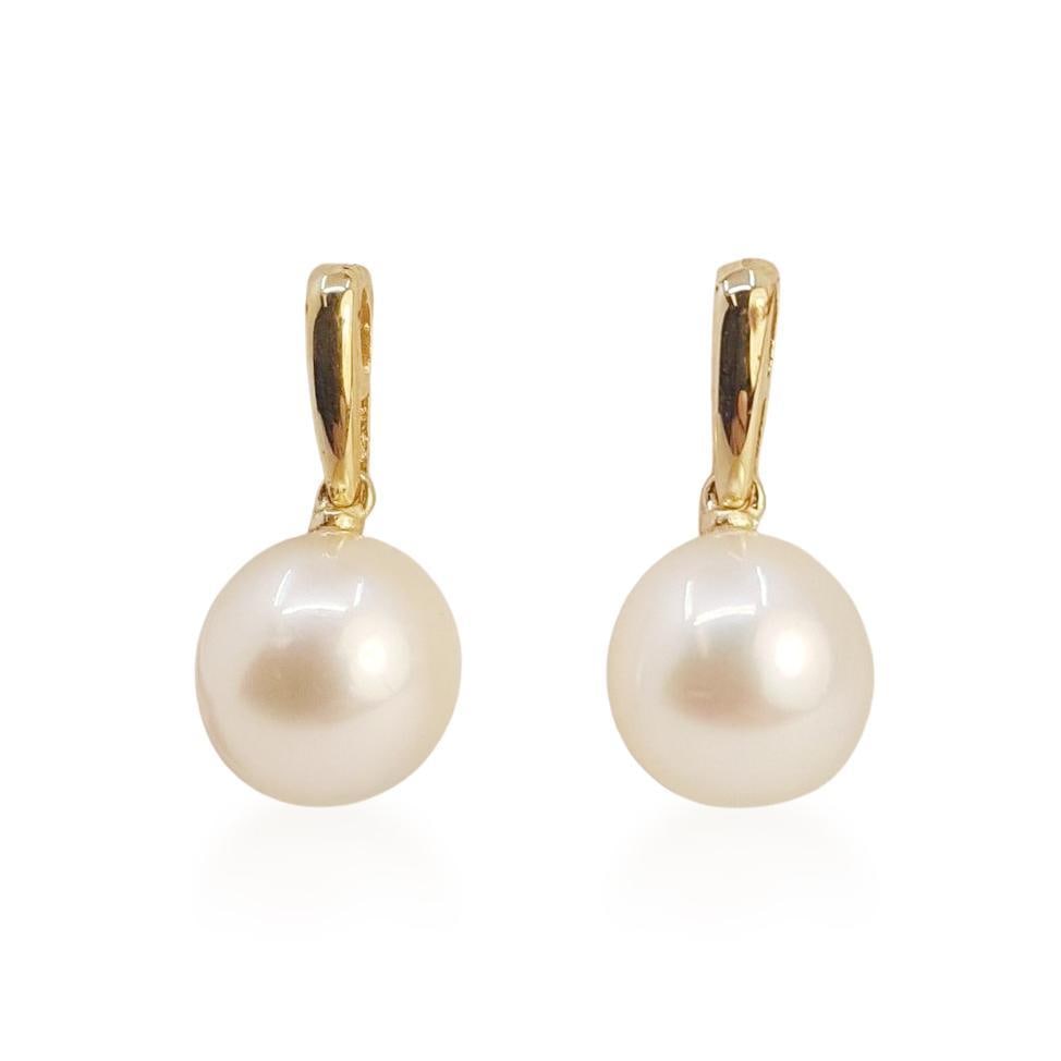 Golden White South Sea Pearl Stud Earrings: ESTIMATED RETAIL PRICE: $1,100* *This is the estimated value a piece of similar quality, craftsmanship, and characteristics could command at retail. Sleek and modern, these drop earrings feature