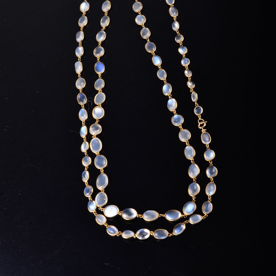 Yellow gold moonstone long chain necklace: Yellow gold, moonshine (avge. .36 x .29mm's) long chain necklace, 44" long