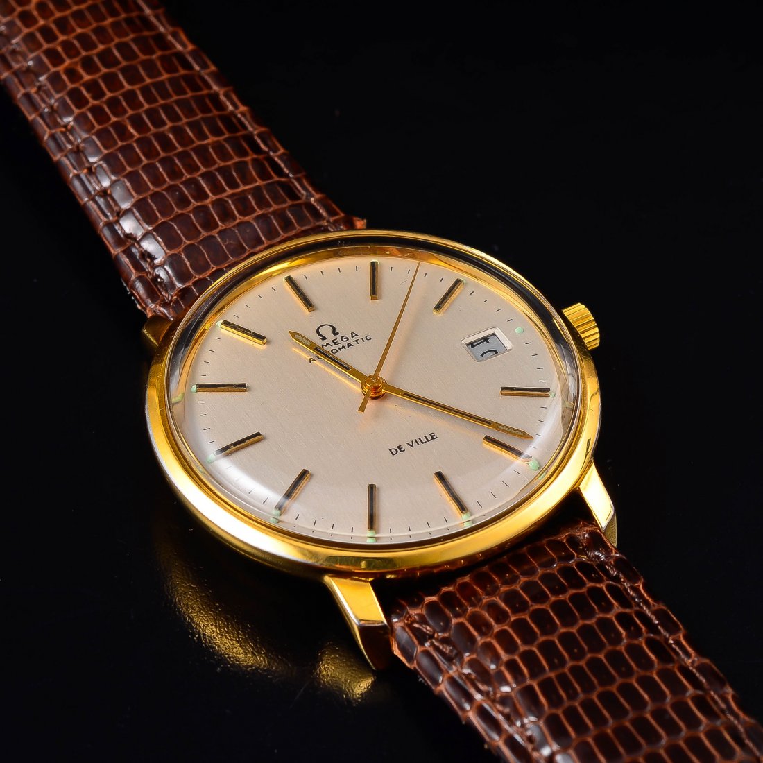 Omega man's 18k gold watch: Omega man's 18k gold watch. 8 1/2 inches, 43.5 grams