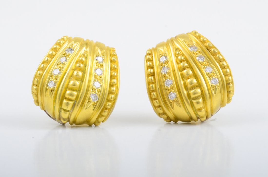 Judith Ripka Gold Earrgins: Judith Ripka gold earrings. Signed 18K approx. length 3/4'', width 3/4'', weight 19.7g