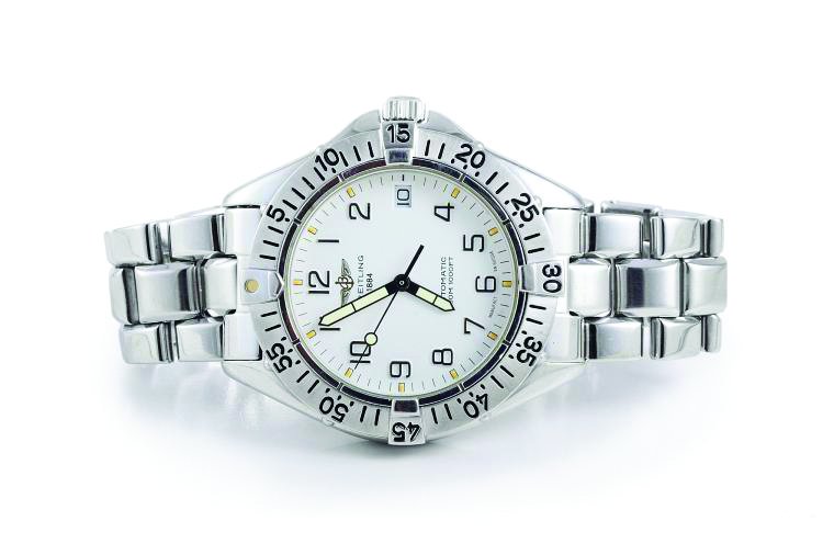 A Stainless Steel Men's Watch, by Breitling: Signed BREITLING 1884 STAINLESS STEEL, automatic etanche 300M 30 ATM, Manufacture en Suisse, A17035 20073. Inner circumference 6 inches. Weight 114g. In original wood box. In excellent condition.