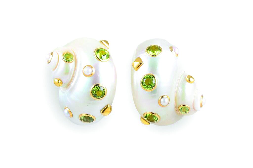 A Pair of Trianon Peridot, Pearl and Shell Earrings: Designed as a pair of shell-shaped earrings, set with round peridots of varying sizes and studding with pearls, gold balls and pyramids; accent gold is 14K; signed Trianon 14K 14810; clip backs; each 