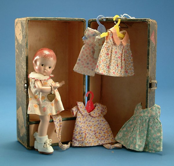 9" Effanbee Patsyette, all comp w/molded hair, br.: 9" Effanbee Patsyette, all comp w/molded hair, br. painted eyes, orig dress & bracelet, w/vintage trunk & homemade wardrobe, some wear & overall crazing G, (est. $100 - $200)