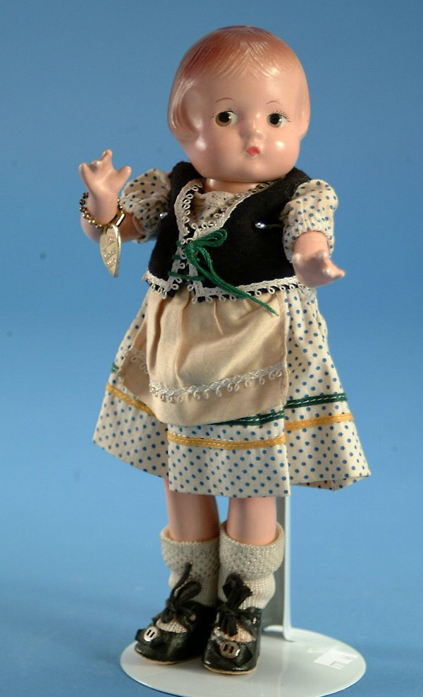 9" Effanbee Patsyette Tyroleon girl, all orig. w/b: 9" Effanbee Patsyette Tyroleon girl, all orig. w/bracelet, all comp, molded hair, br. painted eyes, very minor crazing, VG, (est. $200 - $300)