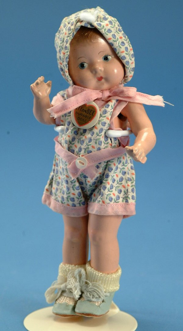 8" Effanbee Patsy Tinyette, all comp, molded hair,: 8" Effanbee Patsy Tinyette, all comp, molded hair, bl. painted eyes, all orig pink & blue sun suite w/heart pin, slight crazing, VG, (est. $100 - $200)