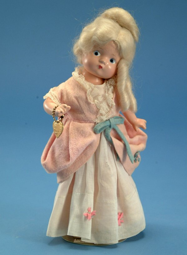 9" Effanbee wigged Patsyette Martha Washington, al: 9" Effanbee wigged Patsyette Martha Washington, all comp, bl. painted eyes, orig costume, slight soiling, orig barcelet, VG-EX, (est. $200 - $300)