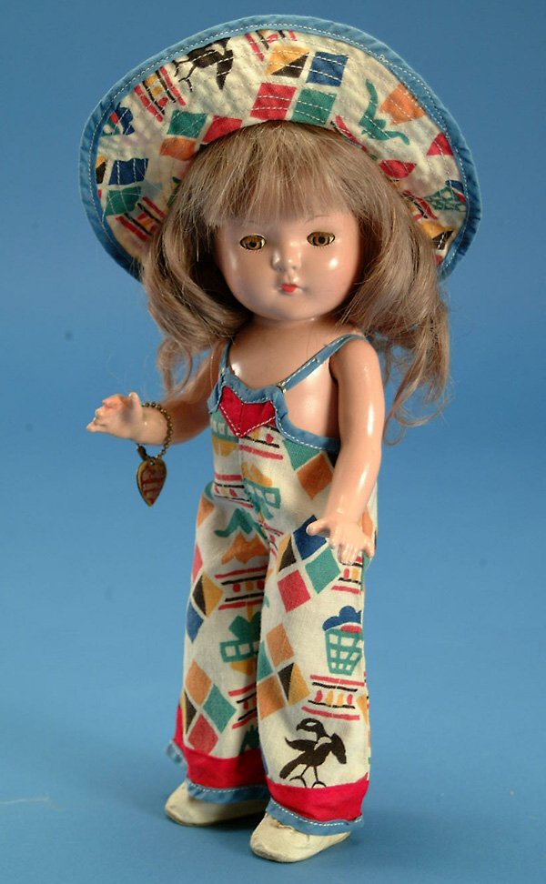 11" Effanbee Wigged Patsy Jr., br. tin sl. eyes, o: 11" Effanbee Wigged Patsy Jr., br. tin sl. eyes, orig. cotton playsuit, replaced wig, repaired finger, lt overall crazing, G, (est. $100 - $200)