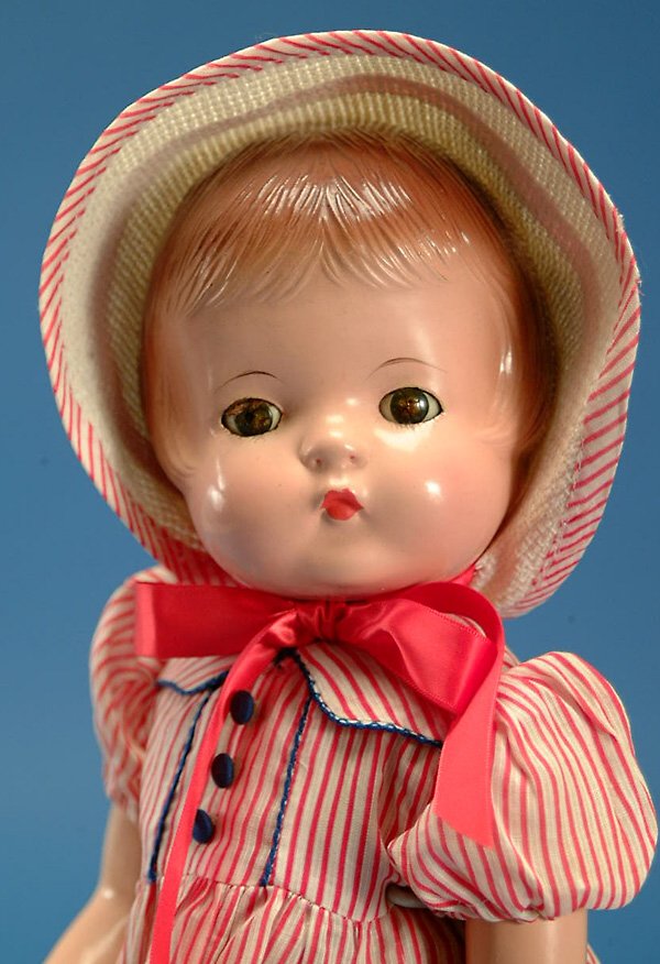 17.5" Effanbee Musical Patsy Joan, br. sl. eyes, c: 17.5" Effanbee Musical Patsy Joan, br. sl. eyes, cloth torso w/music box plays happy birthday, w/comp arms & legs, molded hair, orig. red striped outfit, crazed eyes, paint wear to eyelashes, VG, (est