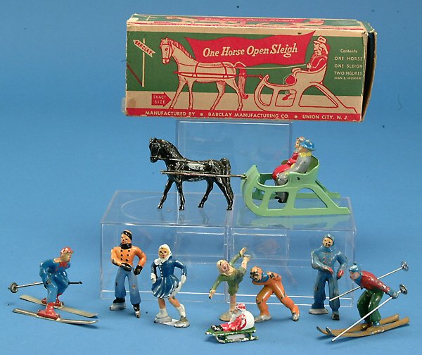 Lot (9) Barclay winter figures incl boxed sleigh, s