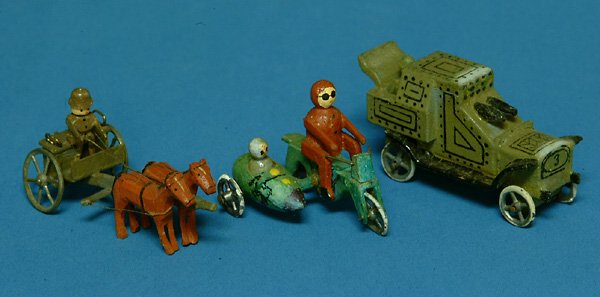 (3) Erzgebirge Toys, painted wood, incl armoured c