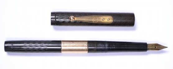 Waterman Ideal #12 14 kt Eyedropper Fountain Pen: This is a Waterman Ideal #12 eyedropper fountain pen with 14 kt gold clip and 14 kt gold monogrammed band, C M A. Dark brown- nearly black- in color, just under 5 1/4" in length (cap on), around 4 3/4
