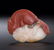 A CARVED CARNELIAN AGATE DOUBLE FISH PENDANT