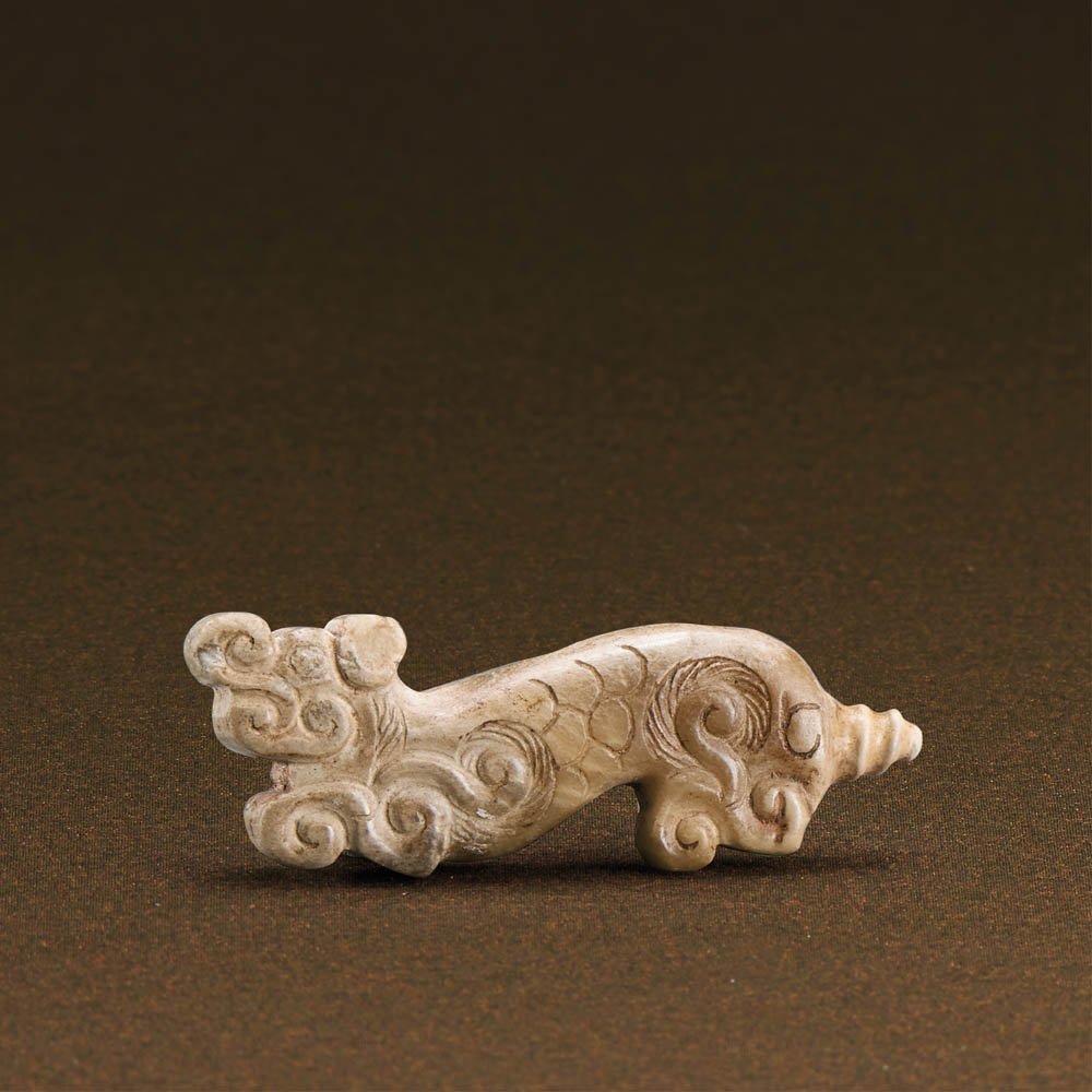 A CHINESE JADE 'TIGER' PENDANT (1 of 3)