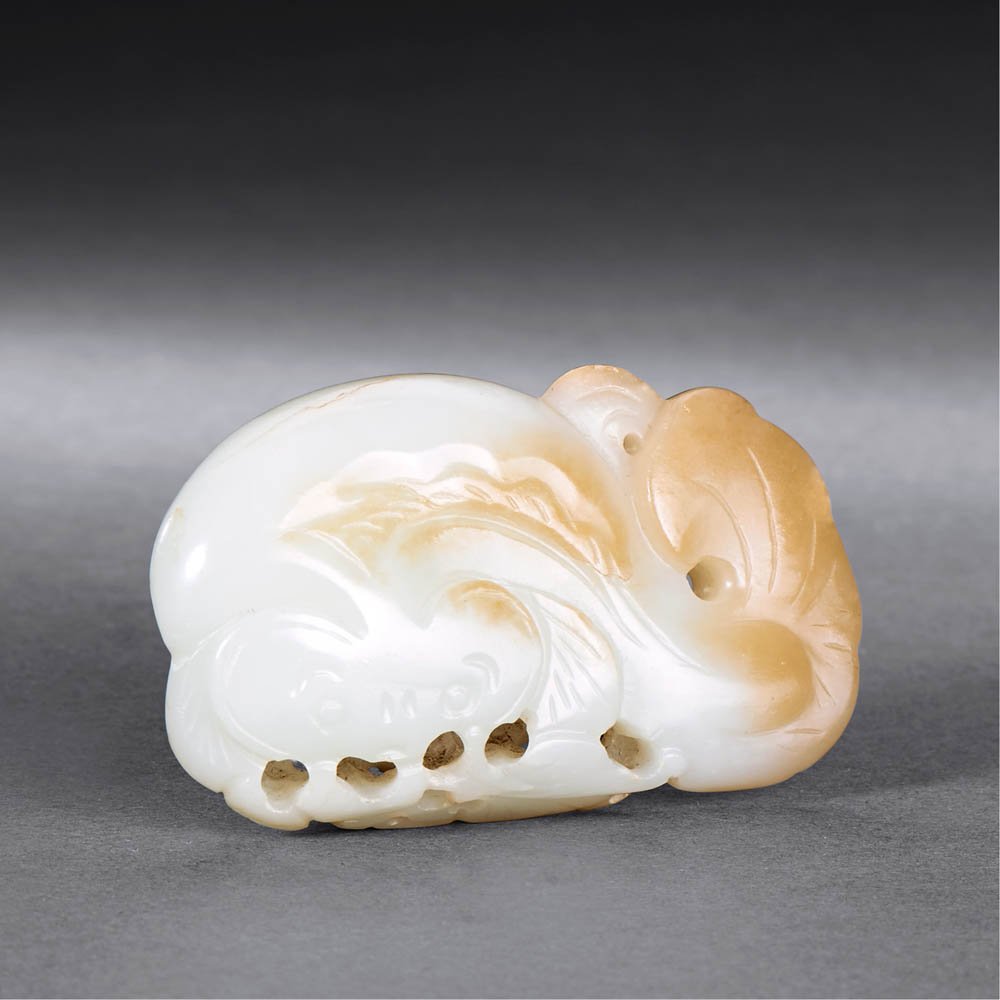 A CHINESE WHITE AND RUSSET JADE PENDANT (1 of 1)
