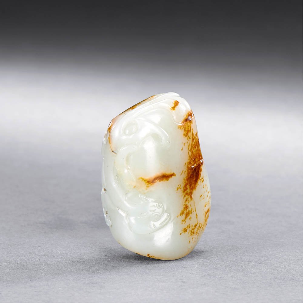 A CHINESE WHITE AND RUSSET JADE CHI DRAGON PENDANT (1 of 1)