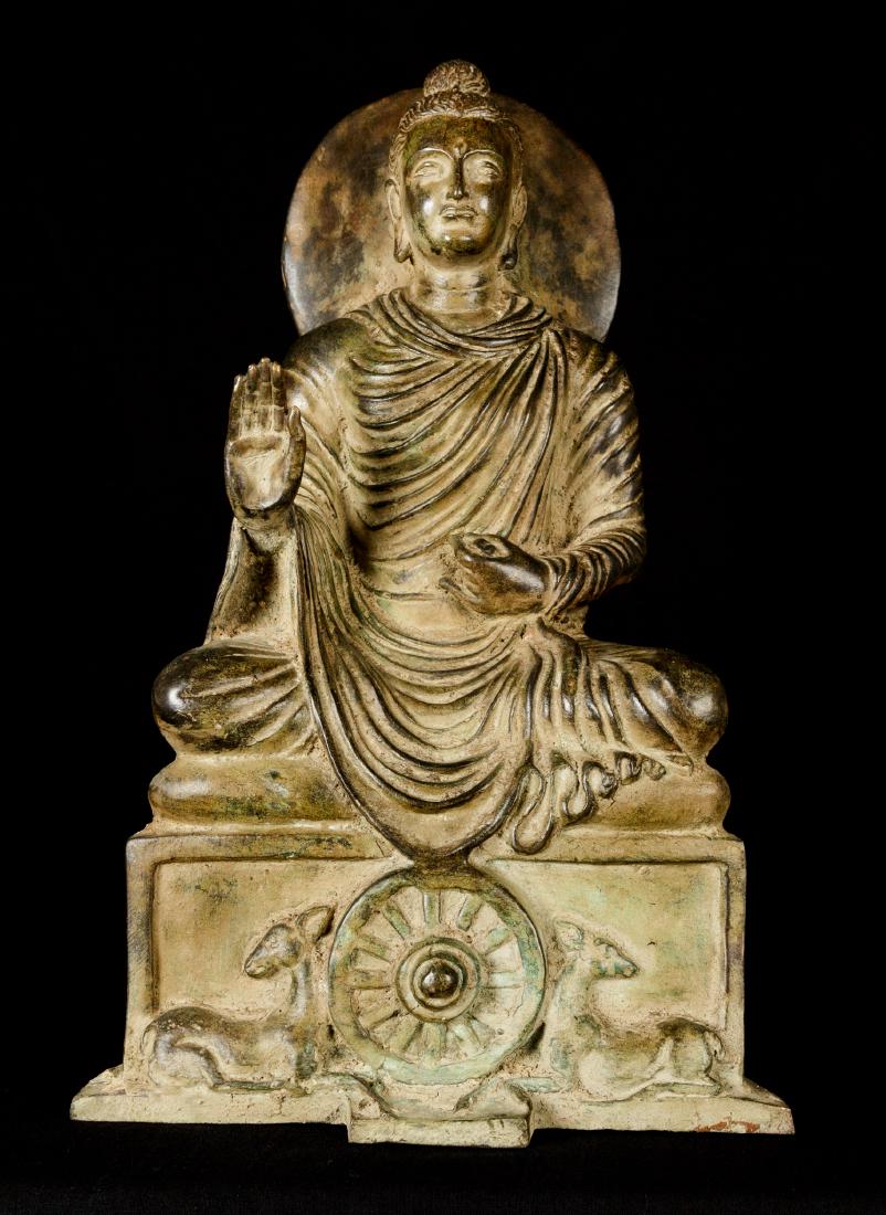 19th Century Ghandara Buddha: Ca. 19th century Ghandara Buddha with right hand raised in abhaya mudra (a gesture of approachability). Please contact us for high resolution images of the piece. Dimensions: 35cm x 22cm x 14cm / 14in