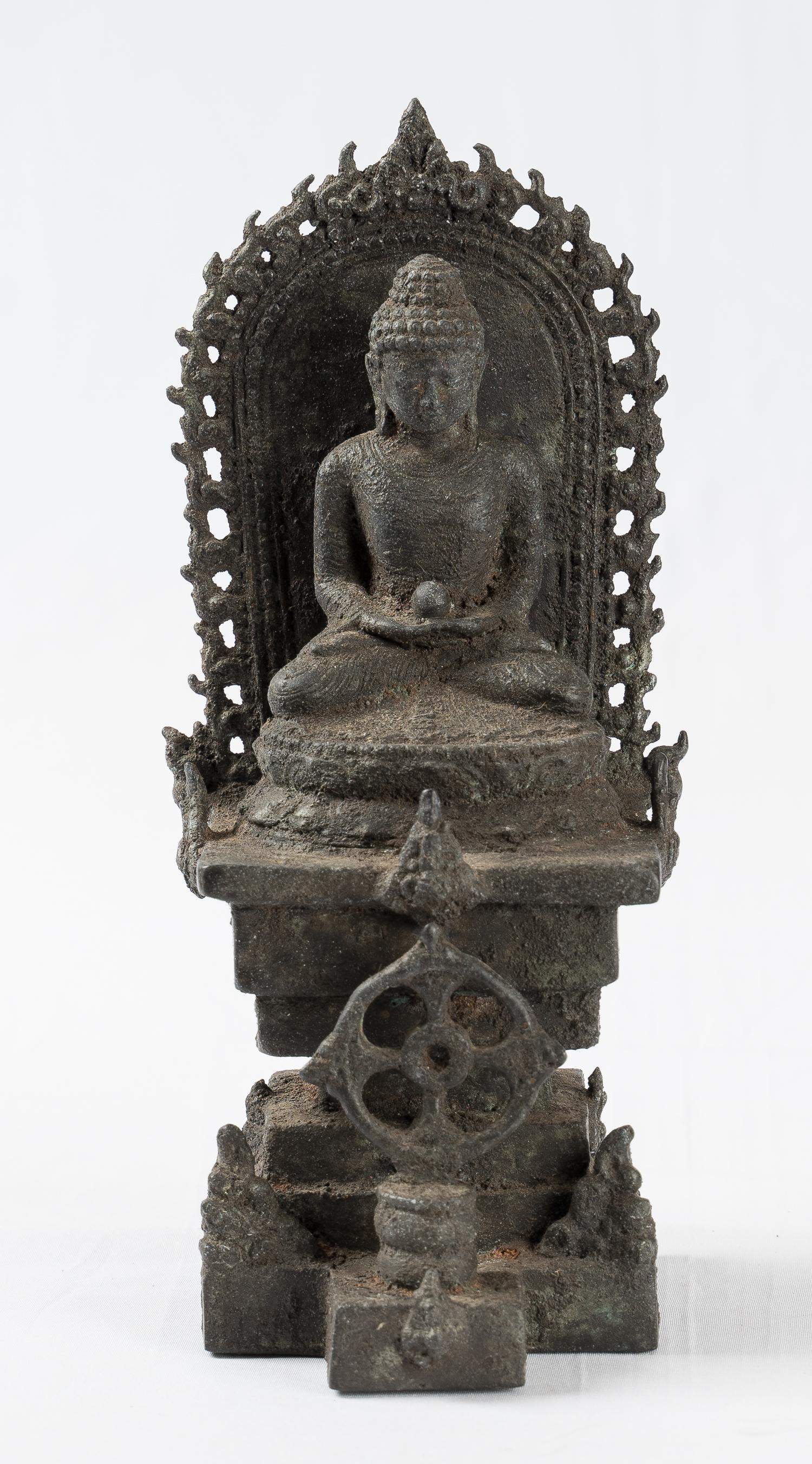 Antique Indonesian Style Bronze Javanese Amitabha: An Indonesian Javanese style Amitabha Buddha perfect for those searching for serenity, meditation or an antidote to desire. â€¨â€¨This delightful Buddha is seated on a double-lotus pedestal, i