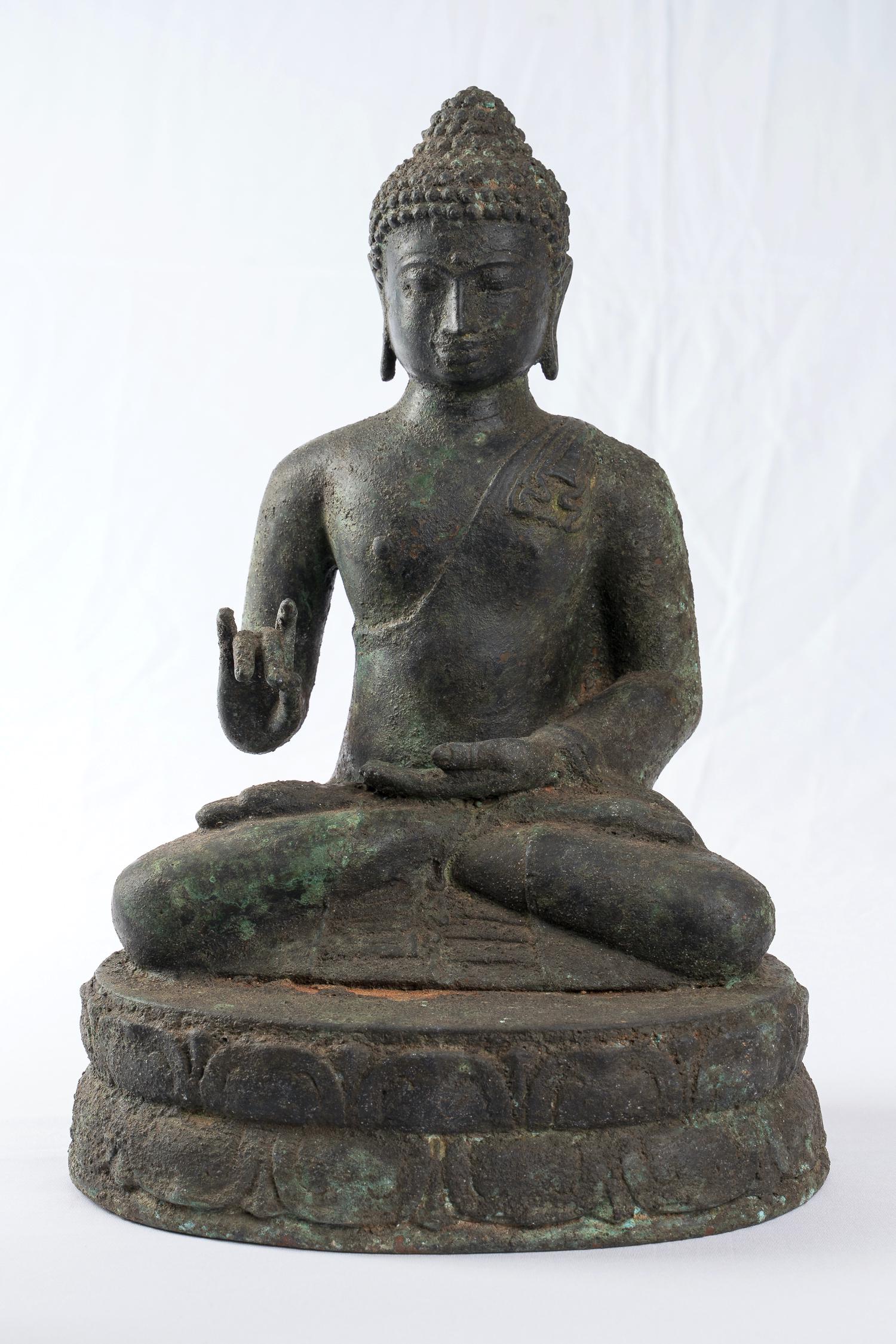 Antique Indonesian Style Bronze Javanese Vairochana: An Indonesian Javanese style Vairochana Buddha perfect for those searching for serenity, an omnipresent spirituality or the vanquishing of ignorance and delusion, leading to wisdom.This splendid Buddh